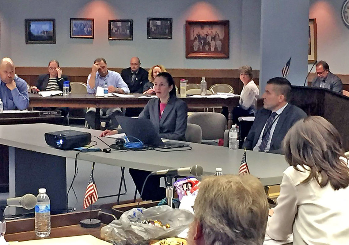 Brandi Deeds and John Sheppard, photographed front and center, in this shot from back when they were both still employed by Seneca County.